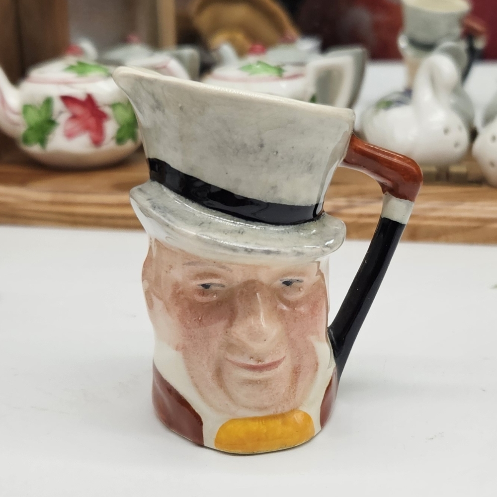 Small character jug